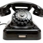 Old-fashioned phone isolated on a white background.